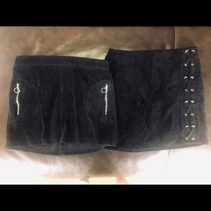 two black ribbed skirts